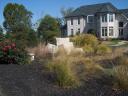 A natural setting in the center island of a circular driveway